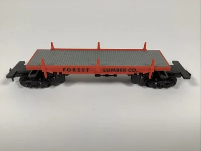 Vintage Life Like HO Scale Unloading Tilting Forest Lumber Log Car - Image 1 of 4