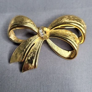 Avon Brushed Gold Tone Ribbon Bow Brooch Pin With White Crystal Accents 2" Width - Picture 1 of 6