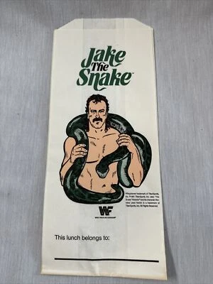Bolsa de almuerzo de papel Jake The Snake Roberts WWF de colección lucha libre 1991 rara Foto 1 de 4