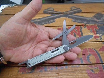 Braçadeira Gerber corte fino multi ferramenta faca tesoura abridor de garrafa - Imagem 1 de 4