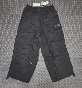 Puma Herren P.A.M. X Flight Wide Leg Cargo Taschen Hose Kordelzug Gr. L Neu - Bild 1 von 8