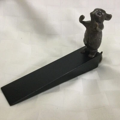 Tapón de tope de puerta de latón vintage con cuña de madera negra Foto 1 de 4