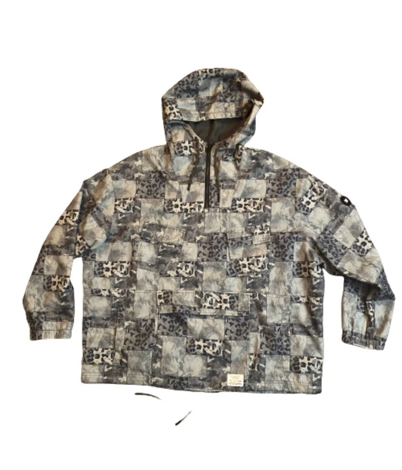 Chaqueta cortavientos DC Shoes Civil Anorak 1/4 cremallera para hombre M camuflaje leopardo rara usada en excelente estado Foto 1 de 4