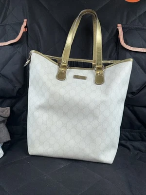 Gucci Supreme Tote Bag featuring the iconic monogram coated canvas w/ gold trim - Image 1 of 4