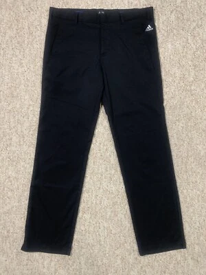 Pantalones de rendimiento de golf Adidas para hombre con logotipo plateado y agarre lateral negros talla 34x32 Foto 1 de 4