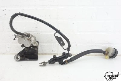 08-12 Kawasaki Ninja 250r OEM Pinza de freno trasera LEER Soporte de montaje Maestro Foto 1 de 4