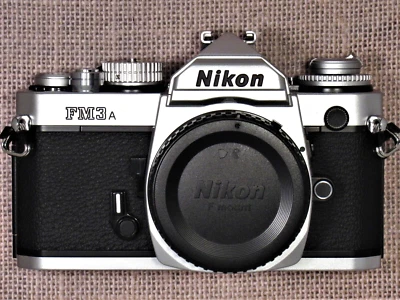 NUEVA, Cámara Nikon FM3A 35mm SLR Plateada FM3A Sin Usar Nueva sin Caja Somos Vendedor de EE. UU. Foto 1 de 4