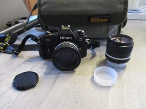 Nikon FG schwarz Body 35mm mit Nikon 50mm F1.8 Nikon 100mm F2.8 E Series Gehäuse - Bild 1 von 8