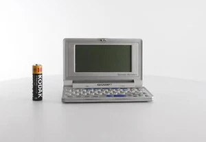 Vintage Sharp Electronic Dictionary, Thesaurus and Puzzle Solver (PWE-300) - Picture 1 of 3