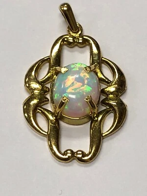 COLGANTE ÓPALO TONO DORADO  Foto 1 de 3