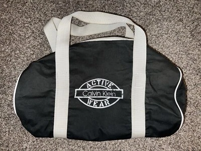 "Bolso de Lona Redondo Vintage Calvin Klein 18"" Gimnasio Viaje Retro" Foto 1 de 3
