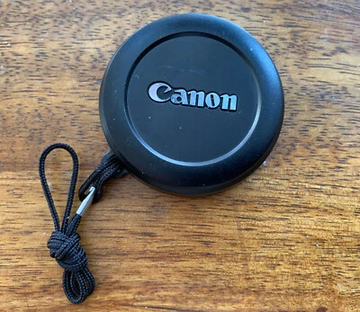 Canon 52mm Silver and Black Front Lens Screw-on Cap (E-52) - Image 1 of 2