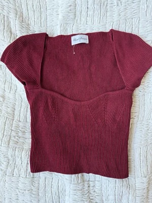 Top corto ajustado Foto 1 de 3