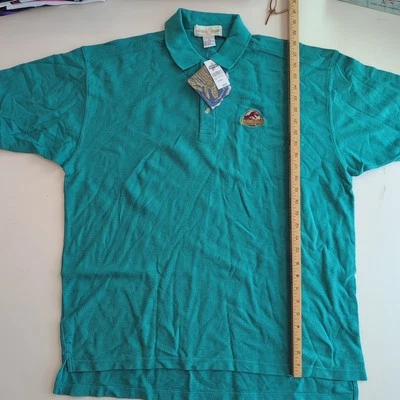 Camisa Polo Vintage Parque Jurásico Años 90 Película Universal Studios Hollywood Nueva Con Etiquetas Verde azulado Foto 1 de 4