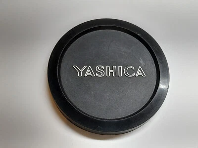 YASHICA 54MM PUSH ON FRONT LENS CAP 50MM 1.4 ML LENS THAT TAKES 52MM FILTERS - Image 1 of 4