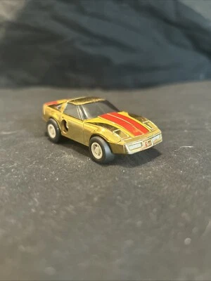 Chevrolet Corvette Tomica TOMY 1984 Ratchet Racers, dorado, 1;64, suelto, Japón Foto 1 de 4