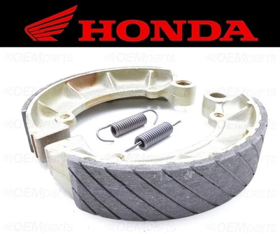 Juego de (2) zapatas de freno y resortes traseros ranurados al agua Honda #06430-MM8-881 Foto 1 de 4