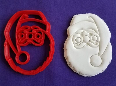 Cortador de galletas cara de Papá Noel Navidad vacaciones comida seguro colores de plástico pueden variar NUEVO Foto 1 de 2