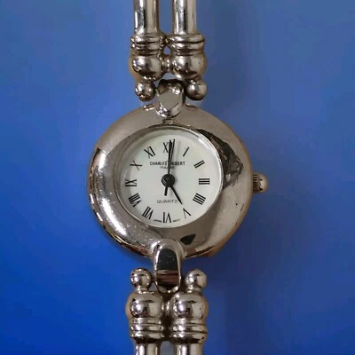 Reloj de pulsera para mujer Charles Hubert brazalete de acero inoxidable esfera perlada 6 1/4"  Foto 1 de 4