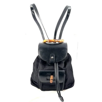 Auténtica mochila vintage de bambú GUCCI de nailon de cuero con bloqueo giratorio con cordón Foto 1 de 4