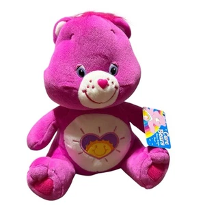 Muñeca de peluche Care Bears Shine Bright Bear rosa corazón sol vientre nanco - Imagen 1 de 6