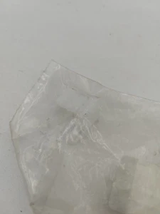 Agrafe plastique de grille de auvent Renault 7701071586 - Imagen 1 de 2