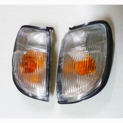 PAR DE LUCES DE ESQUINA INDICADORAS PARA NISSAN D22 NAVARA FRONTIER UTE 97 98 99 00 Foto 1 de 4