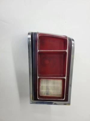 1974-77 AMC Hornet Left Side Rear Tail Light Lens & Bezel Assembly OEM - Image 1 of 4
