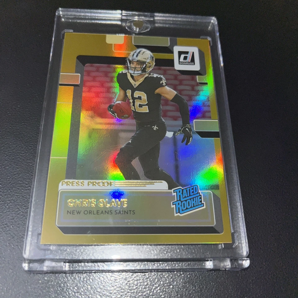 2022 Panini DonrussRated Rookie Chris Olave #P-309 Optic Preview Gold Ice10 AURC - Image 1 of 4