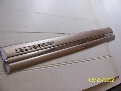 Buick Lesabre Limited 1997 moldura puerta delantera izquierda antílope beige fabricante de equipos originales usado Foto 1 de 4