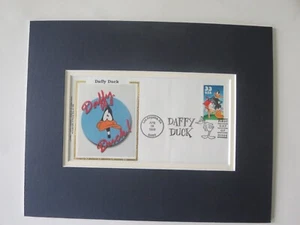 Saluting Looney Tunes & Daffy Duck & the First day Cover of Daffy's own stamp - Picture 1 of 1