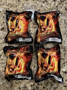 (4) The Hunger Games Foil Pack Collectible Random Figurine Blind Box NEW - Picture 1 of 3