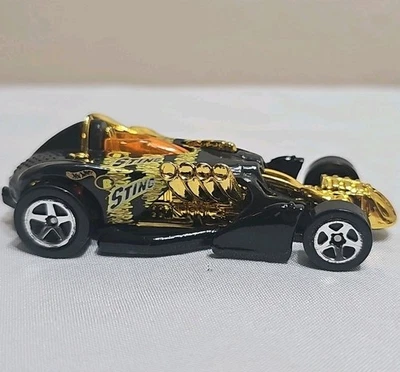 Coche diecast Hot Wheels 2000 Salt Flat Racer B Sting negro naranja y amarillo 1:64 Foto 1 de 4