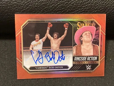 2023 SELECT WWE “COWBOY” BOB ORTON RINGSIDE ACTION SIGNATURE RED PRIZM SP# 1/60 - Image 1 of 4