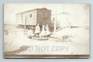 Wyoming, The railroad box cars we lived in, five children, RPPC postcard - Picture 1 of 2