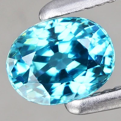 0,62 quilates ovalado 4,95 mm natural suave calor azul circón, ¡el mejor color y brillo completo!💎 Foto 1 de 4