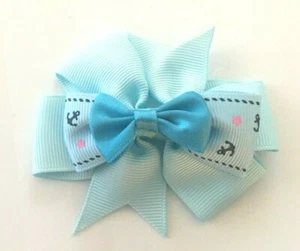 Beautiful Baby Blue inspired hair bow for girls with small soft blue bow. - Picture 1 of 2