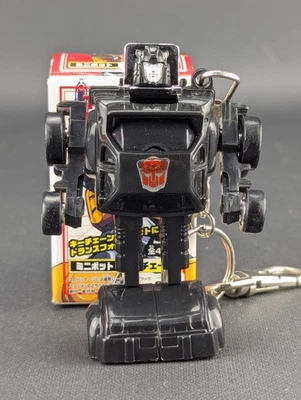 Transformers G1 Negro Cliffjumper Llavero Takara Minibot Reedición Fun4All CHASE Foto 1 de 4