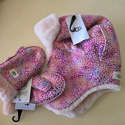 NUEVO JUEGO DE SOMBREROS Y MITONES TRAMPEROS PIEL DE OVEJA PUNTO BRILLANTE UGG ROSA 2-4 AÑOS Foto 1 de 4