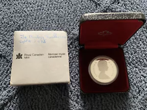 1986 Canada Silver Dollar, Vancouver Centenary 1886-1986 RCM Royal Canadian Mint - Picture 1 of 4