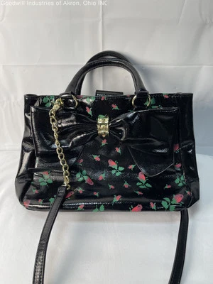 Bolso de mano Betsey Johnson negro con patrón de rosas Gently Loved Foto 1 de 4