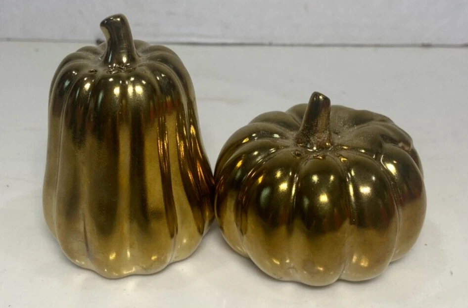 Salero y pimentero calabazas acabado dorado brillante Foto 1 de 1
