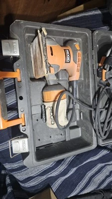 Rigid R2500 Corded Electric 1/4 Sheet Sander 2.4 AMP 120 V With Hard Case - Image 1 of 4