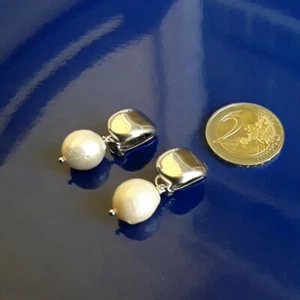 Orecchini clip argento 925 con perla barocca, lunghezza 3,5 cm. - Foto 1 di 4