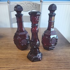 Avon Cape Cod Ruby Red 1876 Collection 2 Decanters & Stoppers & 1 Candlestick