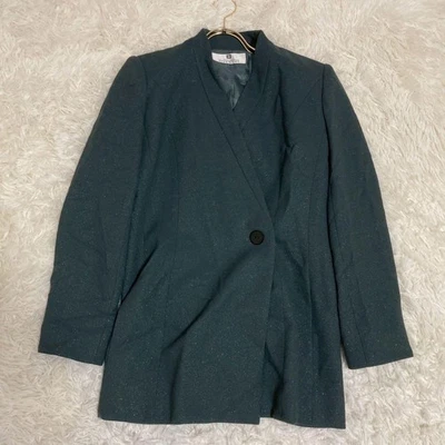 CHAQUETA GLITTER GIVECHY USADA EN VERDE-GRIS PARA USO FORMAL. BUENO Foto 1 de 4