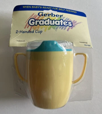 Taza de plástico amarillo y azul Gerber Graduates para 2 manos 6 oz. Vintage 1992 Foto 1 de 4