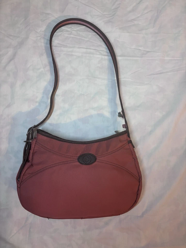 Bolso de hombro Pacsafe Citysafe antirrobo para mujer - naranja quemado Foto 1 de 4