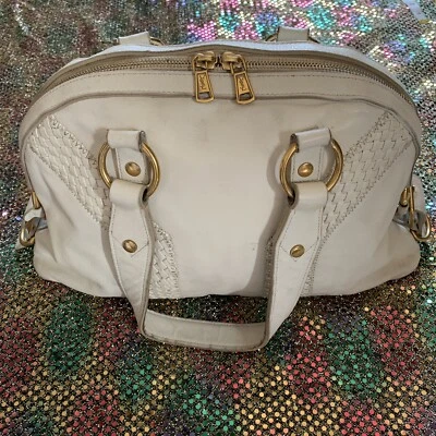 Bolso de mano Yves Saint Laurent para mujer de cuero marfil con asa superior Muse Foto 1 de 4