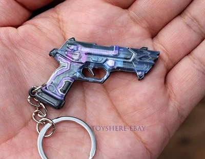 TOY VALORANT Pistola Estética Mecánica Campo de Batalla Metal Llavero Regalo Foto 1 de 2